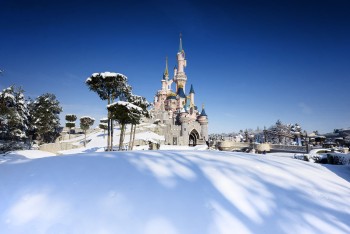 Enchanted Christmas snow covered Sleeping Beauty Castle