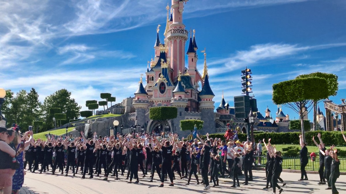 Time to Shine parade at the foot of Sleeping Beautys Castle Disneyland Paris