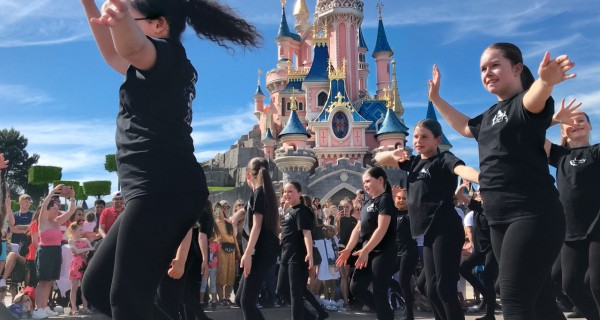 Time to Shine parade in front of Sleeping Beautys Castle